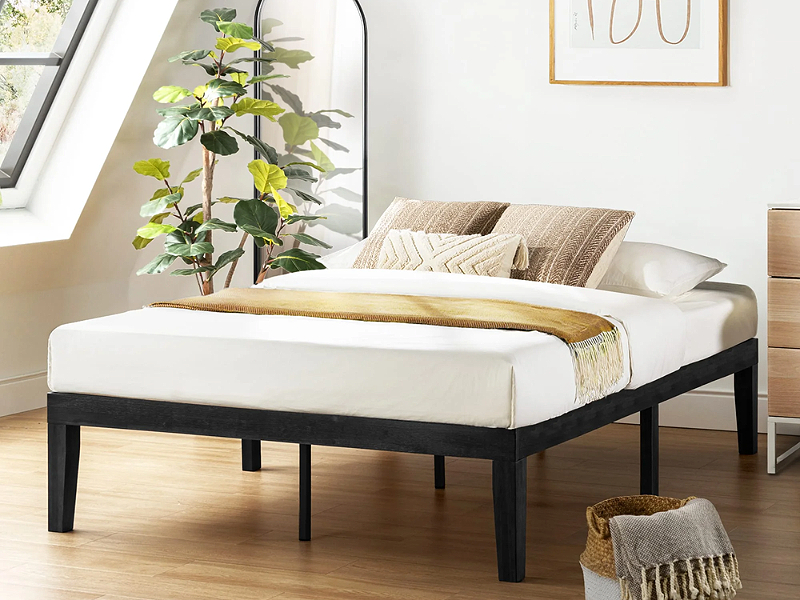 Giường đơn được làm bằng gỗ tự nhiên phủ màu đen (Nguồn: Sưu tầm)