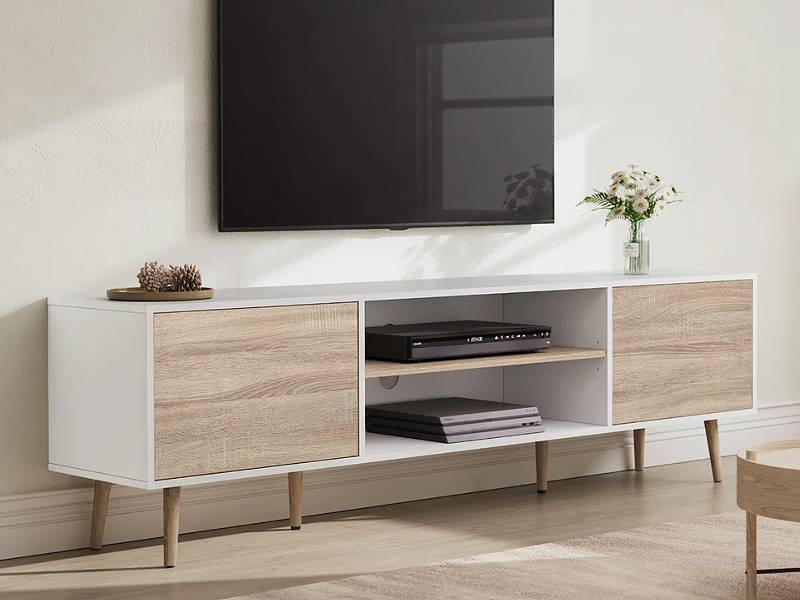 Kệ tivi 2 tầng được làm từ gỗ mdf thiết kế 4 chân vót thon gọn tạo cảm giác tinh tế và thanh lịch cho không gian (Nguồn: Sưu tầm)